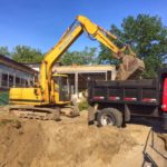 Excavating for a new ADA ramp at Eden Park Elementary School in Cranston, RI.